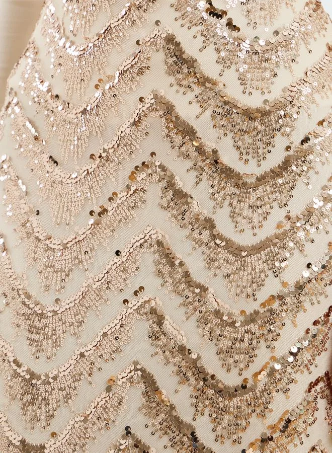 ستايلي تنورة ماكسي نسائية مزينة بالترتر واللون الذهبي